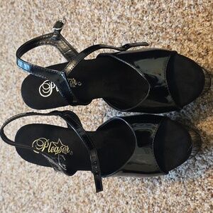 Pleaser black patent platform heel. Size 8. New